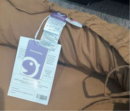 Tags showing “CooCooBaby” and the manufacturing information