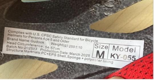“Model KY-055,” Batch No: 202503” and “Production Date: March 2025” are printed on a label on the inside of the recalled Gudook bicycle helmet.