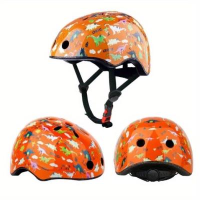リコールされた子供用自転車ヘルメット - オレンジ色に恐竜のプリント