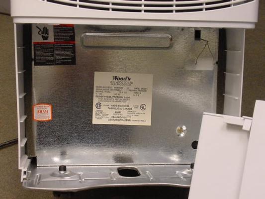 Picture of label behind the removable water bucket of recalled dehumidifier