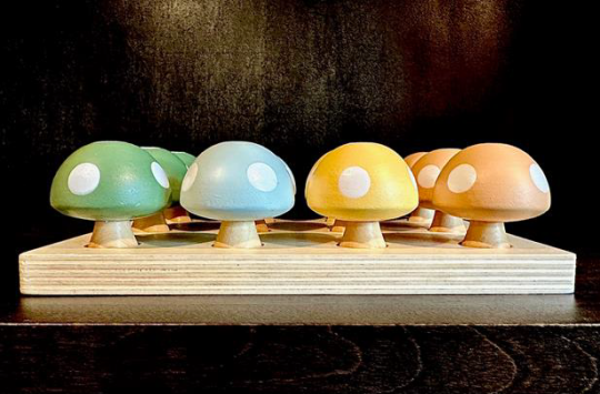 Recalled Hearth & Hand with Magnolia Toy Mushroom Peg Sorter side view