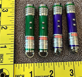   Recalled Mini Laser Pointer Keychains – (Green and Purple)