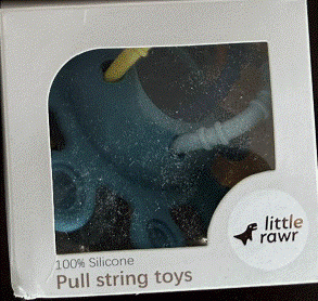 Recalled Little Rawr Silicone Pull String Teething Toys- Front of packaging