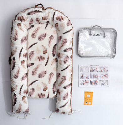 Recalled Yoocaa Baby Lounger in feather print