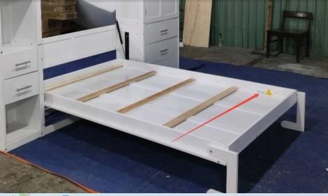 Location of yellow SKU sticker on inside of bed frame