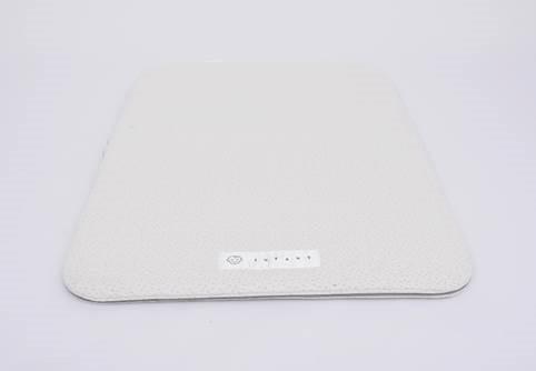 Infant side of Recalled Modera Organic Cotton Pack N Play Mattress Dual-Sided Portable Baby Crib Pad