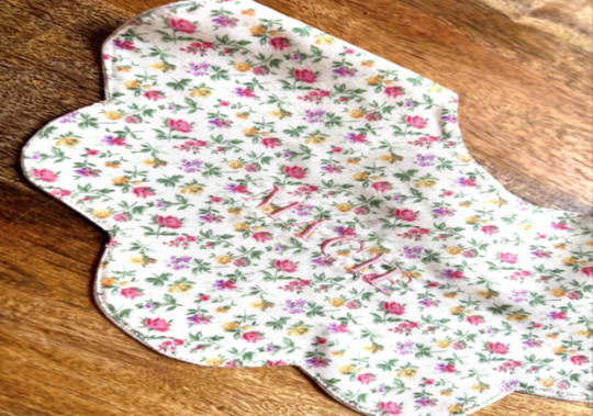 Recalled bib with floral print