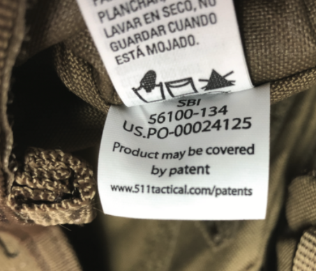 The PO and style number is located on the third label which is sewn into the side seam.