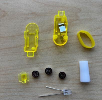 Recalled POPOOO finger lights have three internal button cell batteries that power Jungle Safari character projections