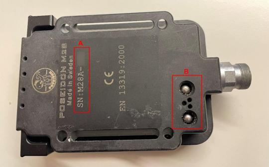 Serial Number beginning with “M28A-” and two wet-switches located on the back of recalled Poseidon A28 Dive Computer