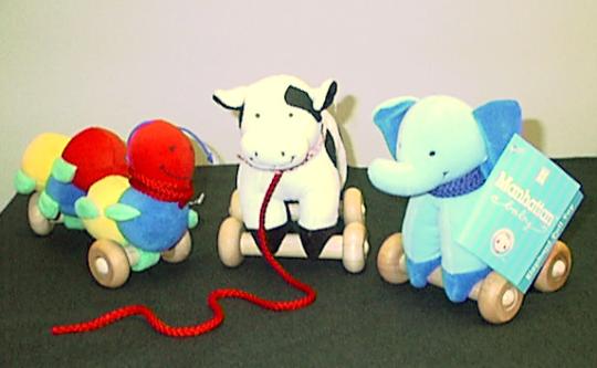 Recalled Pull toys: Enchanted Garden Inchworm, Merry Meadows Cow, and Sunny Safari Blue Elephant
