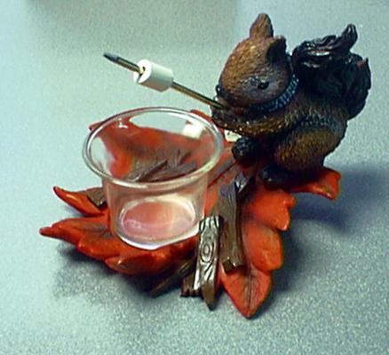 Recalled candle holder