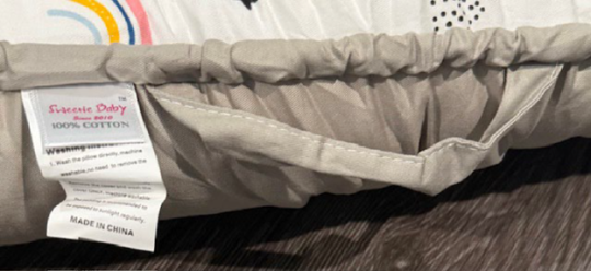 Sweetie Baby is printed on a tag on the side of the recalled baby lounger 