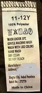 “Batch No.: 272779” and the size are printed on a sewn-in seam label. 