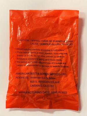 Red Bag Containing Recalled Tip-over Restraint Kit
