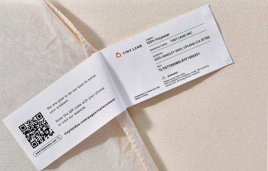 The Tiny Land logo and batch number TLTGTT003BG-XYF1506251 are printed on a label stitched on inside of the recalled play tent.