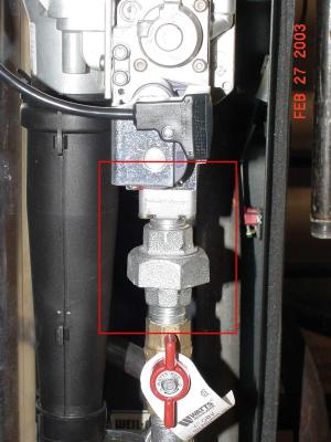 Recalled gas broiler, with red square highlighting affected area