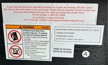 “Tracking/Lot #: HCV202601” and “Production Date: 01/2026” are printed on a label under the dressers’ top panel of the dresser