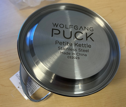 “Wolfgang Puck Petite Kettle” appears on the kettle’s underside