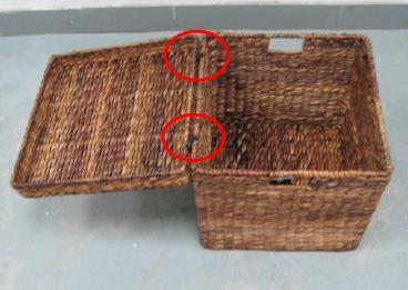 Recalled woven storage trunk showing standard hinges