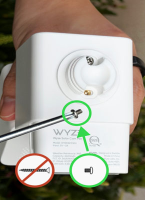 The short pan-head screws should be used to attach the solar panel to the camera. The long flat-head screws are for mounting the unit to the side of a house.