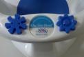 The web address “www.onestepahead.com” appears on the One Step Ahead model of the Idea Baby bath seat.