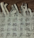 Close up of the threads on the perimeter of the recalled woven blanket