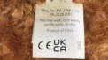 Location of manufacturing date code on the recalled recalled Bubba Bull Plush Toy tag