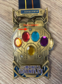 Recalled Avengers Infinity Gauntlet Medal showing faulty magnet 