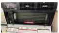 The model and serial number are location inside the Kühl® Q Air Conditioner