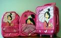 Mulan backpacks and rolling luggage