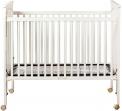 Example of Recalled Drop Side Crib with External Plastic Hardware