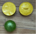Recalled Rainbow Mystery Squishy Bun and tan container