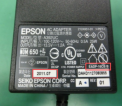 The recalled adapter bears the internal part code “EADP-16CB B