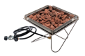 Recalled Takibi Propane Insert (model ST-332-US) with reddish brown lava rocks inside the Snow Peak’s Pack & Carry Fireplace 