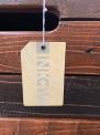 The INK+IVY brand is printed on a tag hanging from a dresser drawer