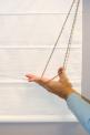 Picture of recalled insulated black-out roller shades and insulated Roman shades