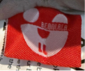 “Bearlala” is printed on an attached label on the outside of the recalled baby lounger’s cover