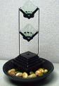 Recalled water fountain with candle holder