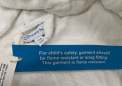 Recalled The Company Store Children’s White Robes neck label