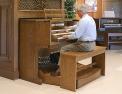 Recalled wooden organ bench with organ
