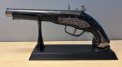 Violative Antique Gun Lighters  