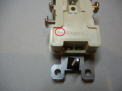 Rear view of recalled receptacle with location of date code circled