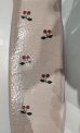 Close-up of Cherry print on the Recalled Konges Sløjd Scooter – model KS101544-P00005