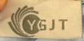 “YGJT” is printed on an attached label on the outside of the baby lounger’s cover