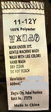 "Batch No.: 272779" and the size are printed on a sewn-in seam label