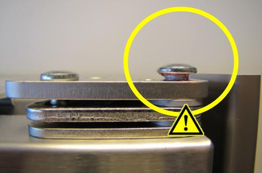 Detail of door hinge pin popped up