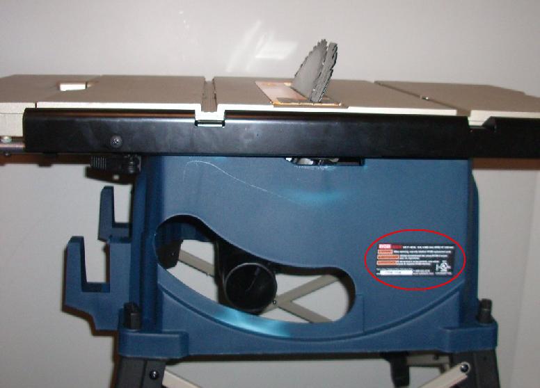 Picture of Recalled table saw showing location of label on rear of saw