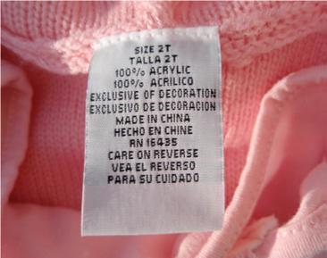 Picture of Label on Recalled Hooded Sweater